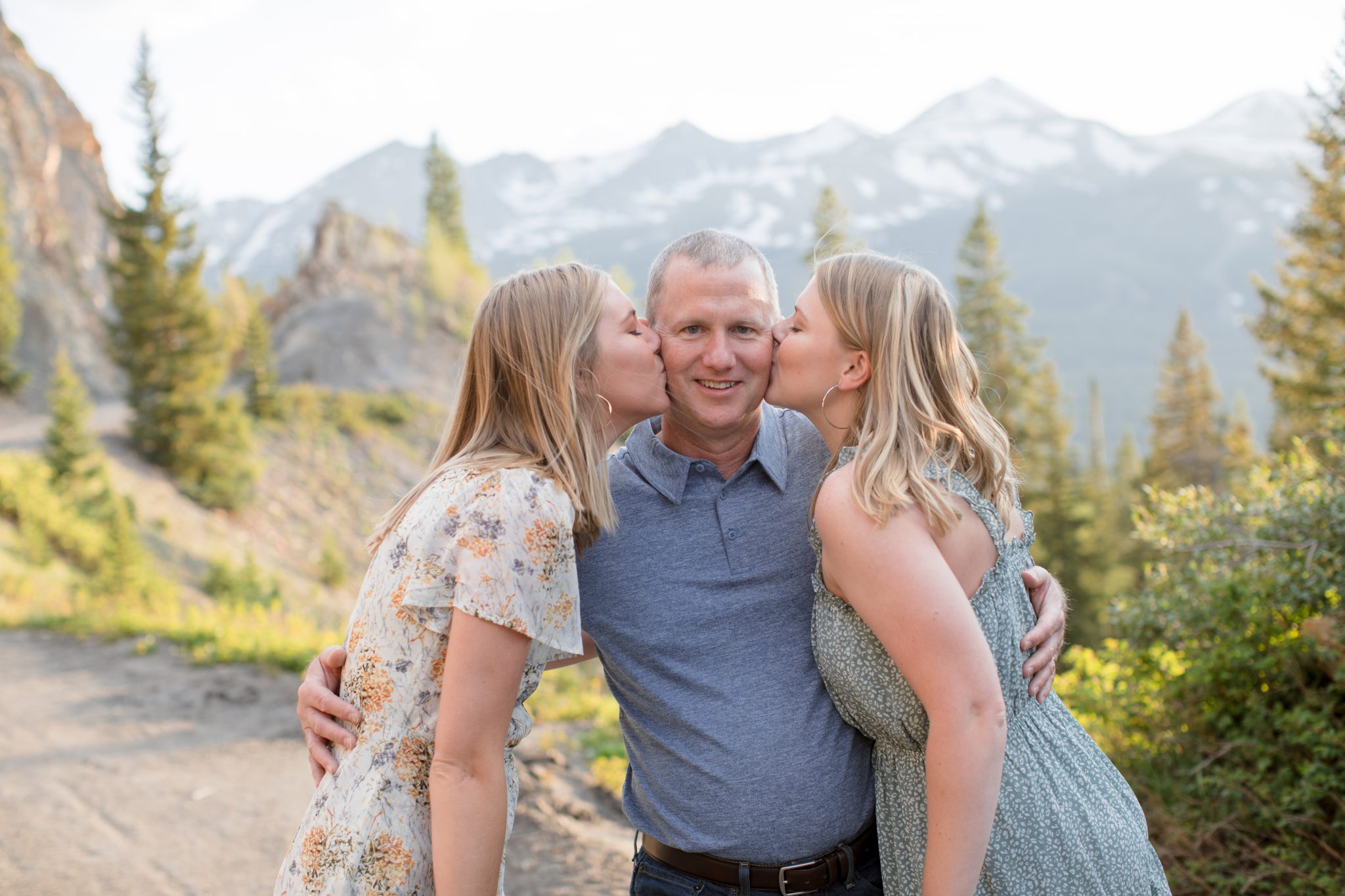 Dad with daughters family portrait photography in Breckenridge Colorado