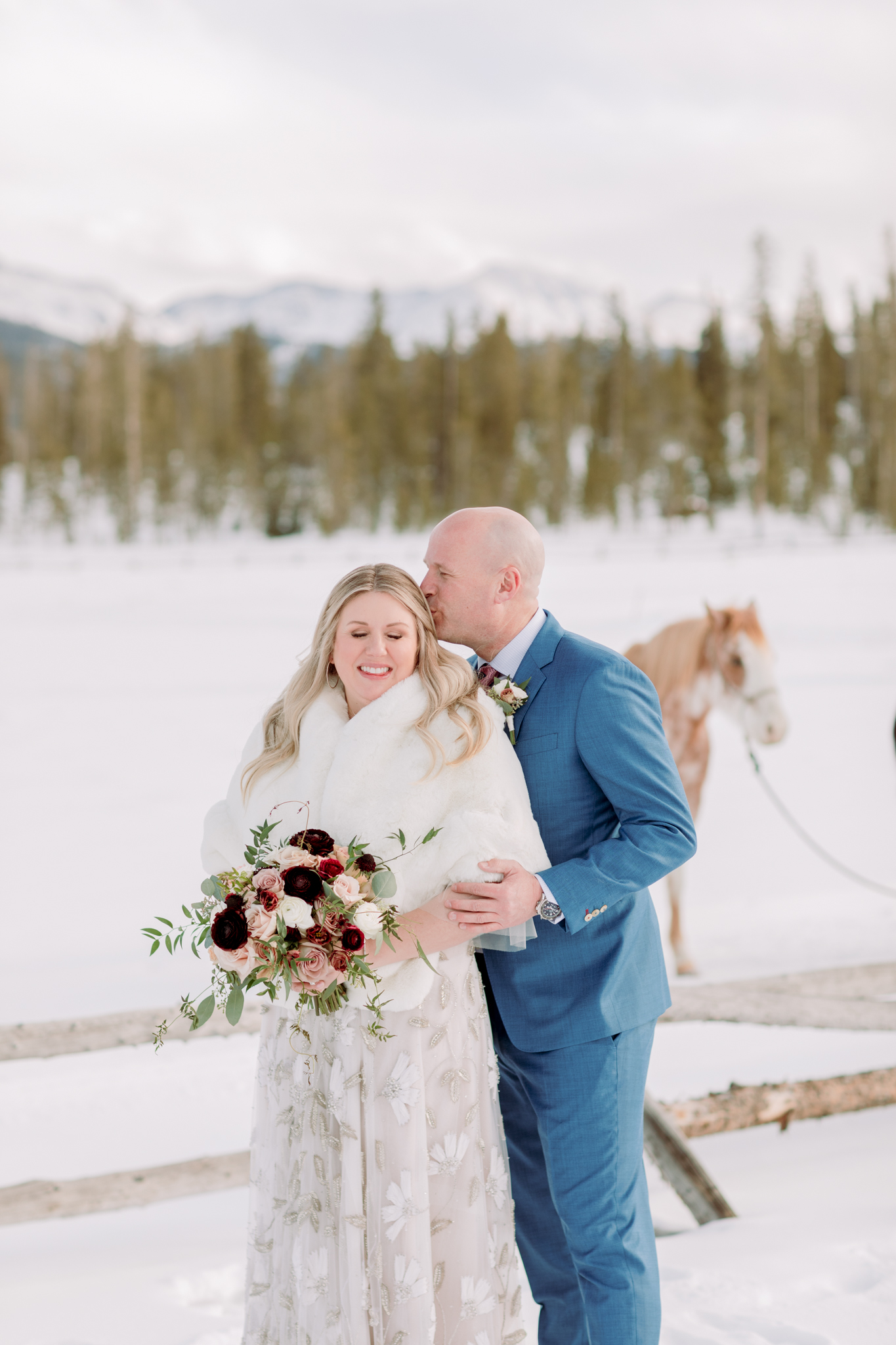 Devils-Thumb-Ranch-Tabernash-Colorado-Winter-Outdoor-Wedding-Bride-and-Groom-Portraits