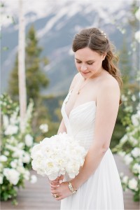 all white wedding with greenery in florals round bouquet bridal portrait