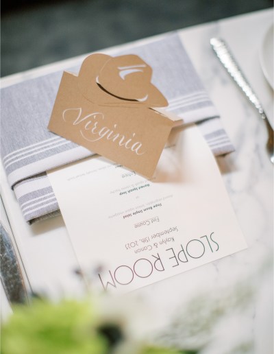 stationery by kitty custom cowboy hat place cards with white ink calligraphy escort cards